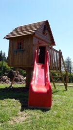 Kinderhaus mit einer Rutsche auf einem Hühnerbein aus Akazienholz – Bild 3
