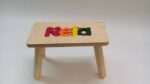 Holzhocker CUBS mit dem Namen NELA